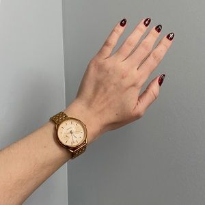 Rose gold stainless steel watch